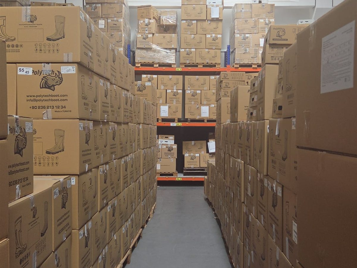 PolyTech Boot cartons on pallets in the warehouse, ready for shipment