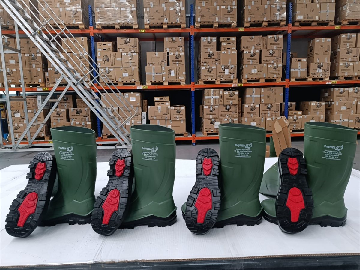 RHINO PU/TPU boots arranged to show their outsoles